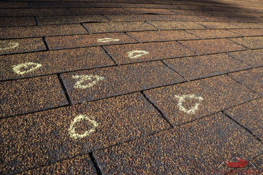 Hail Damaged Roof That Needs Impact Resistant Shingles